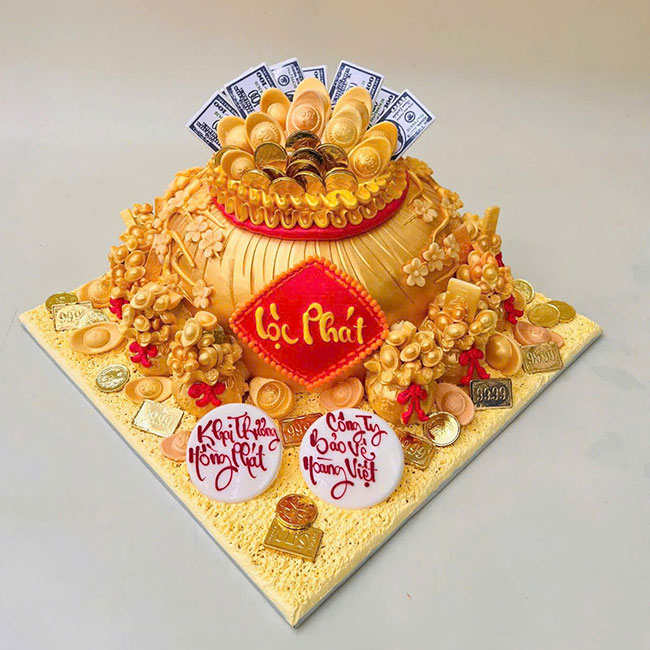 10-banh-kem-sinh-nhat-tao-hinh-3d-tui-vang-Loc-Phat-ban-chay